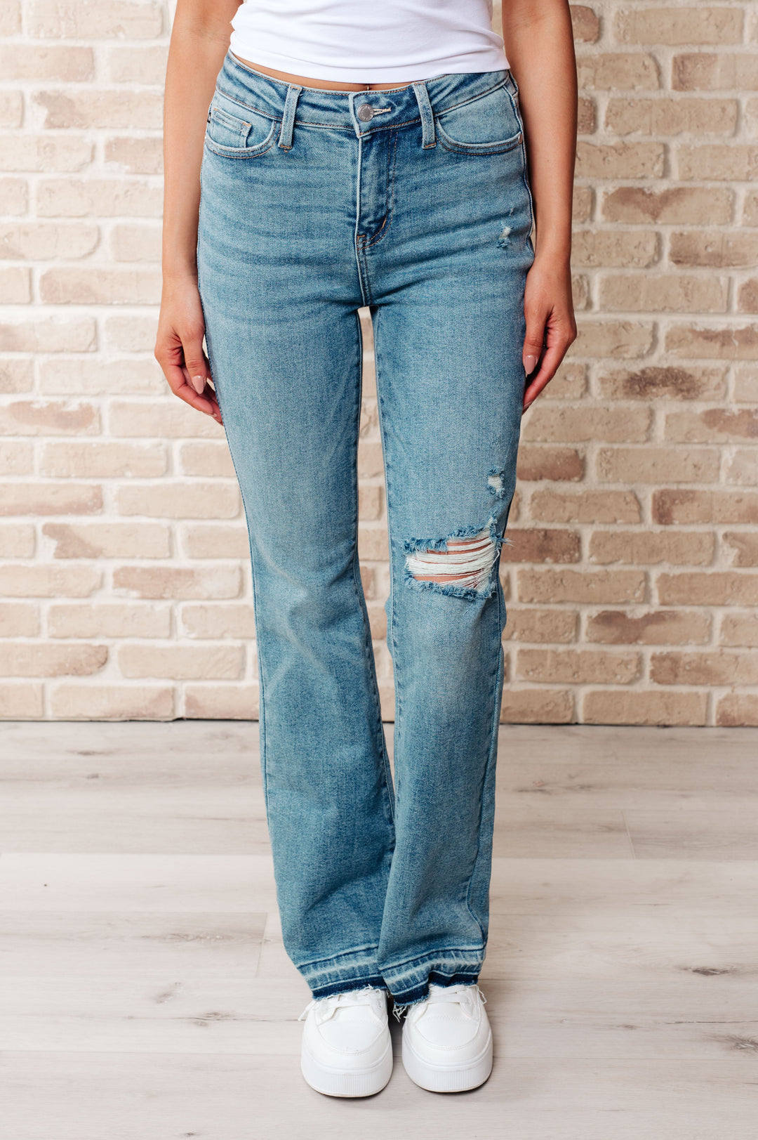 Isla Mid Rise Distressed Released Hem Bootcut Jeans by Judy Blue