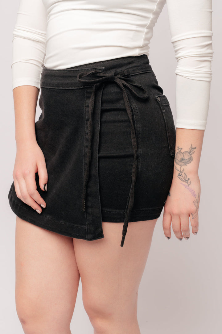 Bentli High Rise Side Tie Denim Skort in Black by Judy Blue