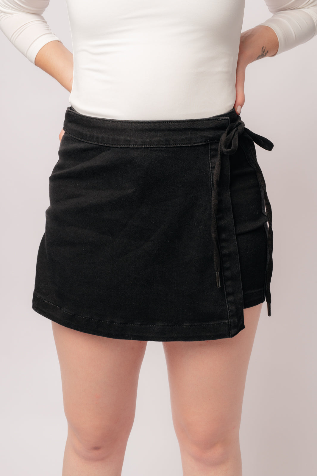 Bentli High Rise Side Tie Denim Skort in Black by Judy Blue