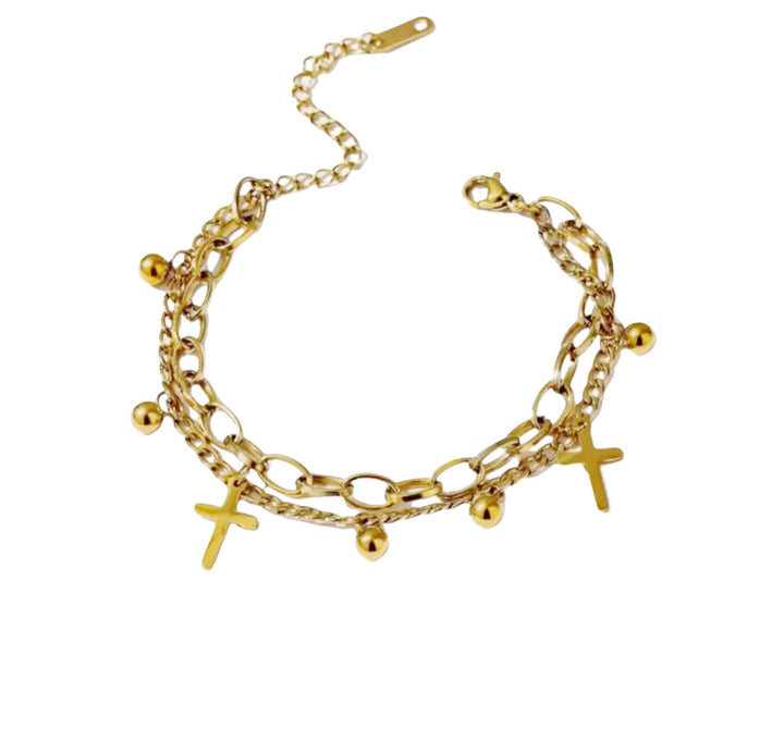 Cross Charm Bracelet by Lauren Kenzie