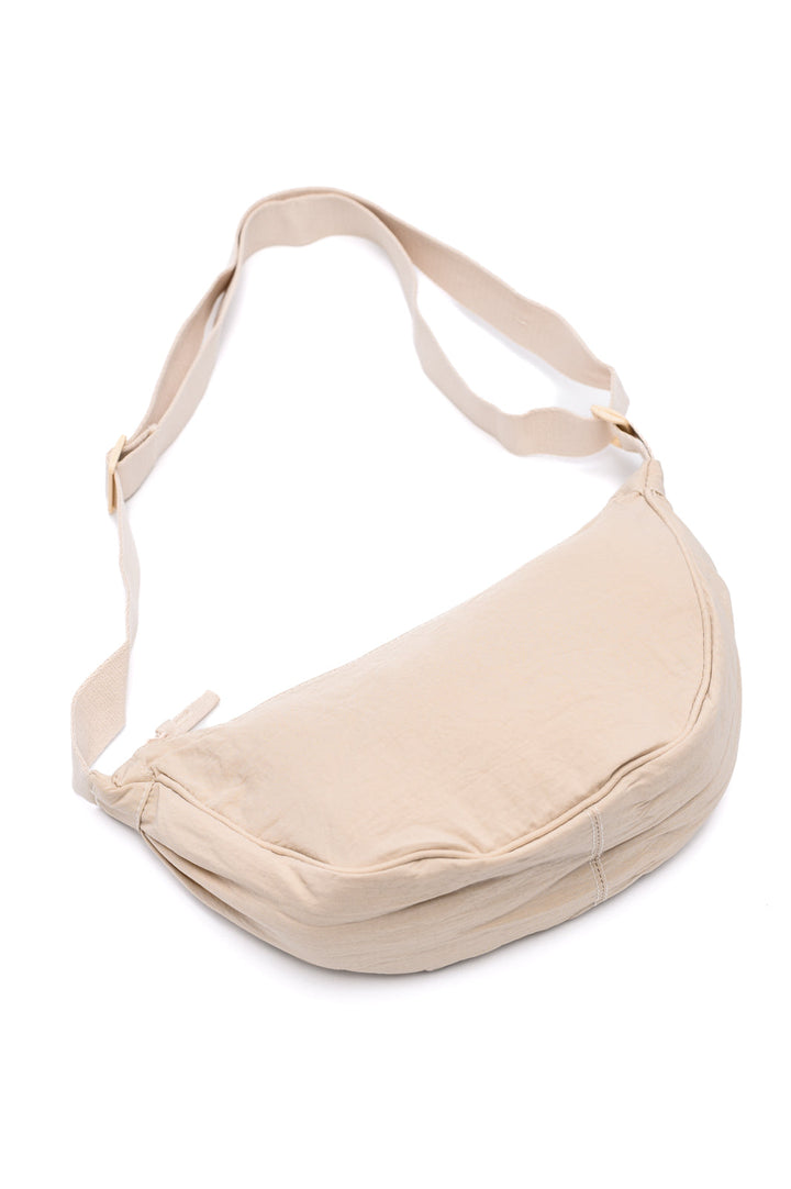 Essentially Everything Round Mini Crossbody Bag in Off White - 1/2