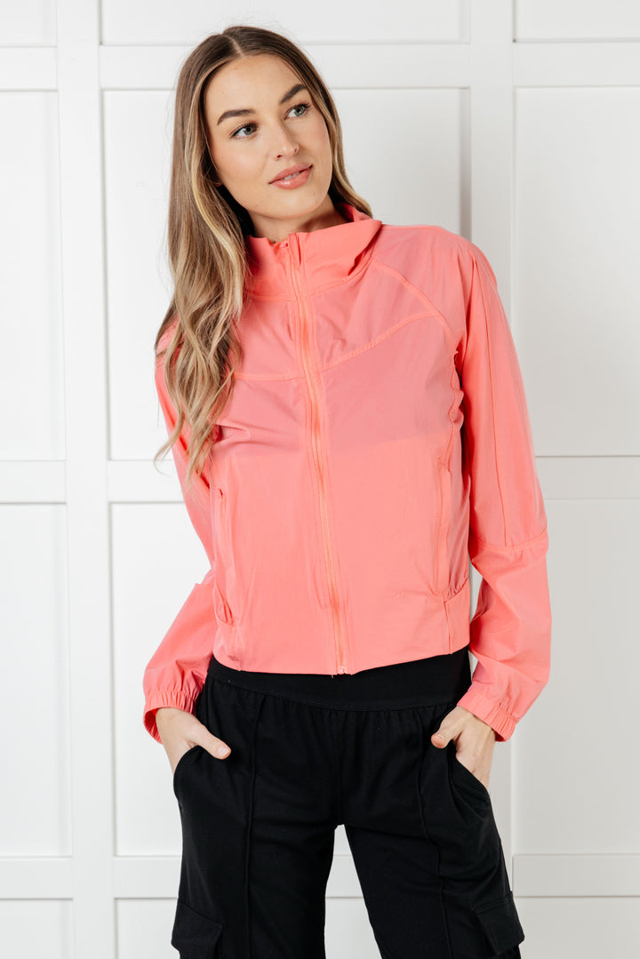 Fit Happens Nylon Tennis Jacket in Coral Rose - 1/2