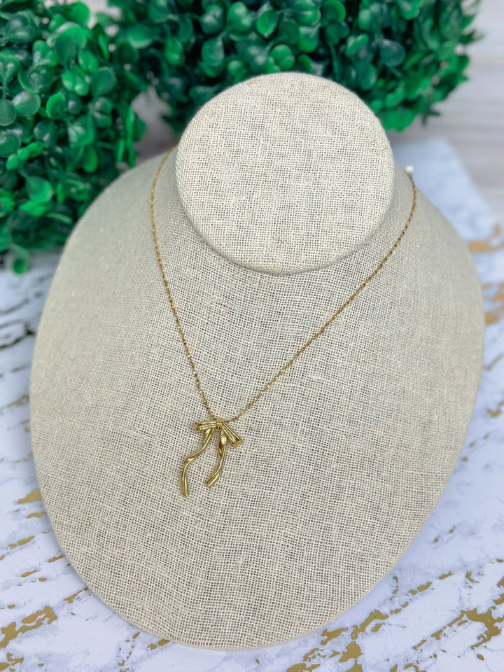 Angelic Bow Necklace by Lauren Kenzie