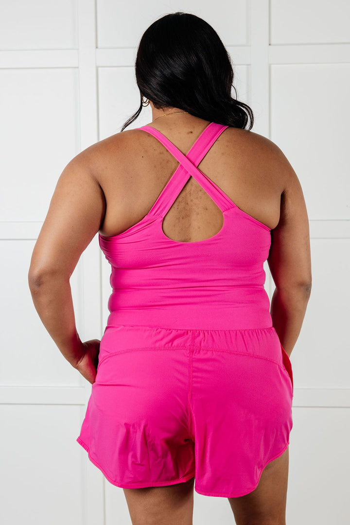 Raising Heart Rate Cutout Runsie In Sonic Pink - 1/2